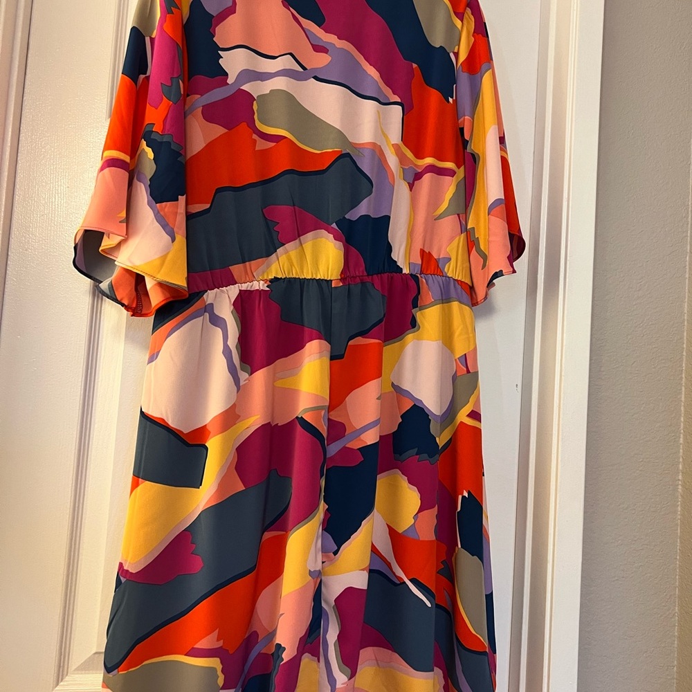 Multi color dress. Lower v neck.
